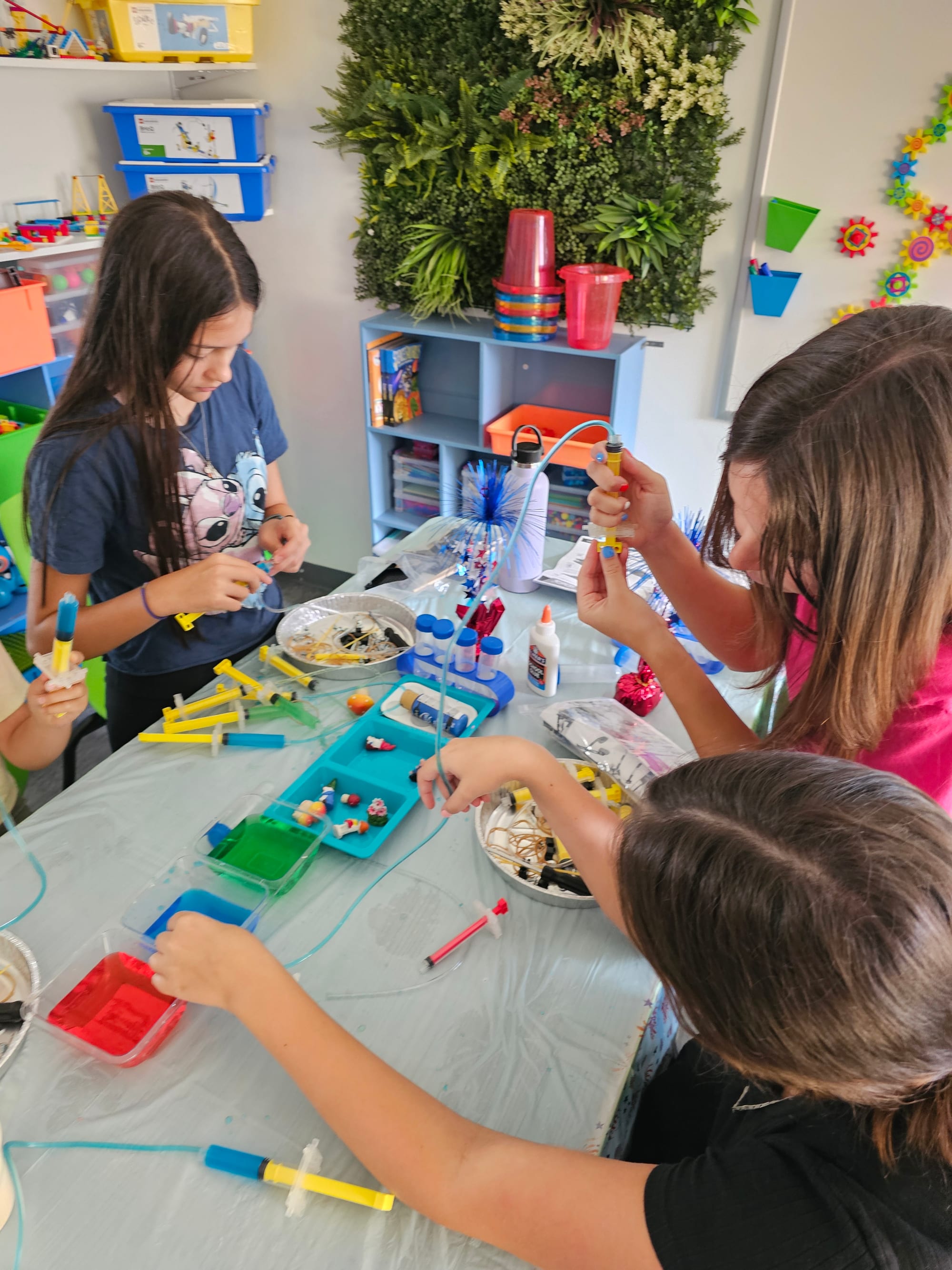 Students learning together at Curious Innovators